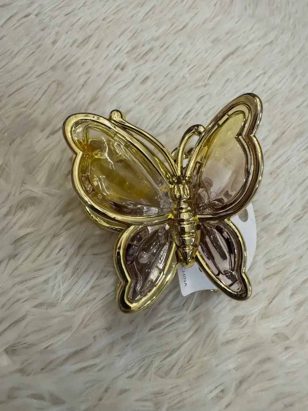 Gold butterfly claw clip with clear wings